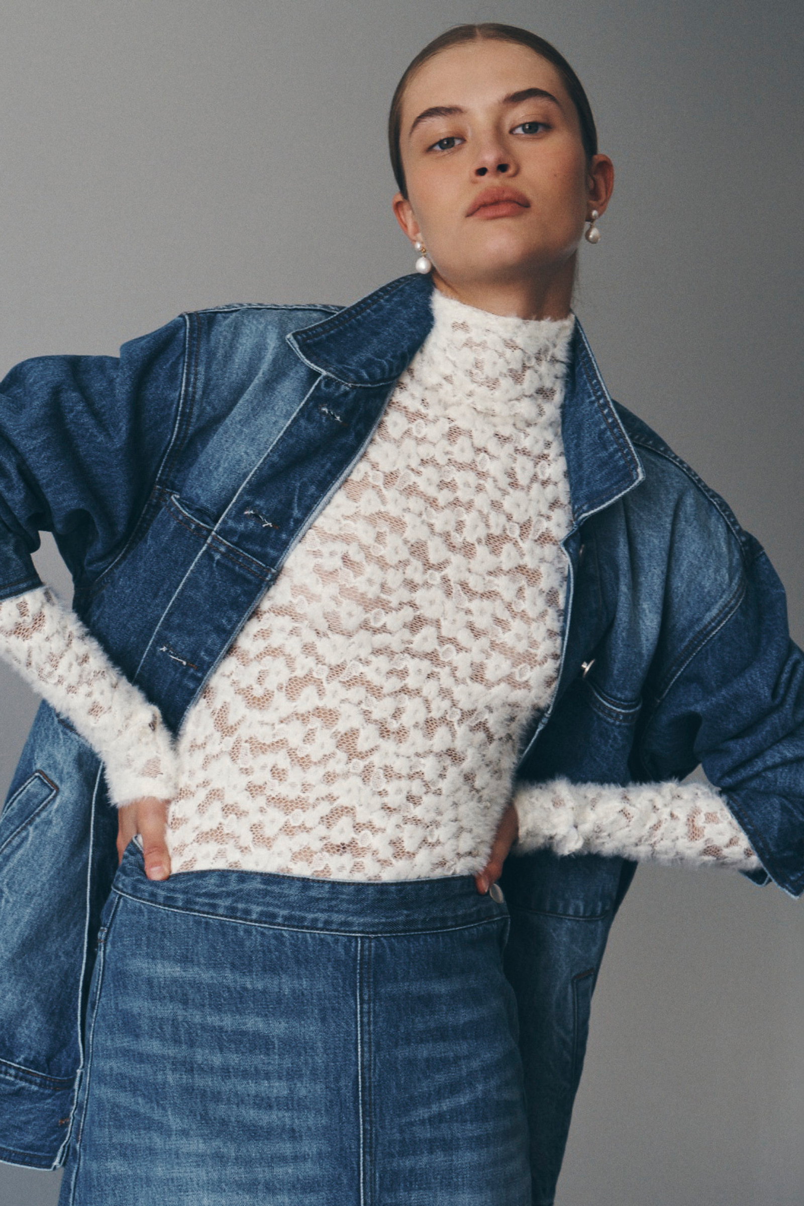 Bianca wears the Iko Relaxed Denim Jacket, Valerie Hemp Midi Skirt, and Galo Lace Fuzzy Top in Creme. All pieces are from ROWIE The Label’s Autumn / Winter ’24 Collection.